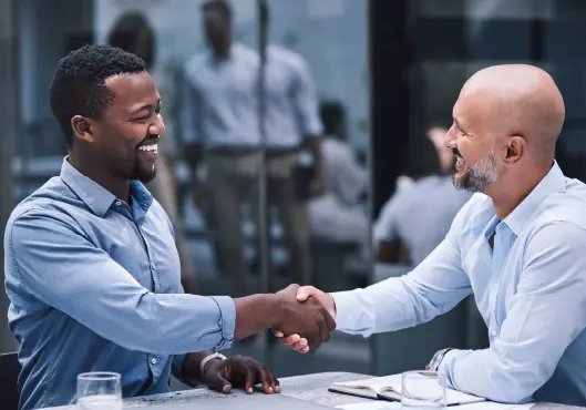businessmen shaking hands during a meeting. businessmen shaking hands during a meeting.