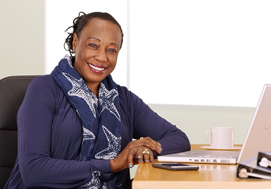 SME Life Pack woman sitting at her desk